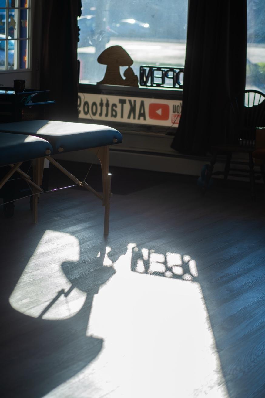 AK Tattoo studio interior natural light Anchorage Alaska — professional tattooing