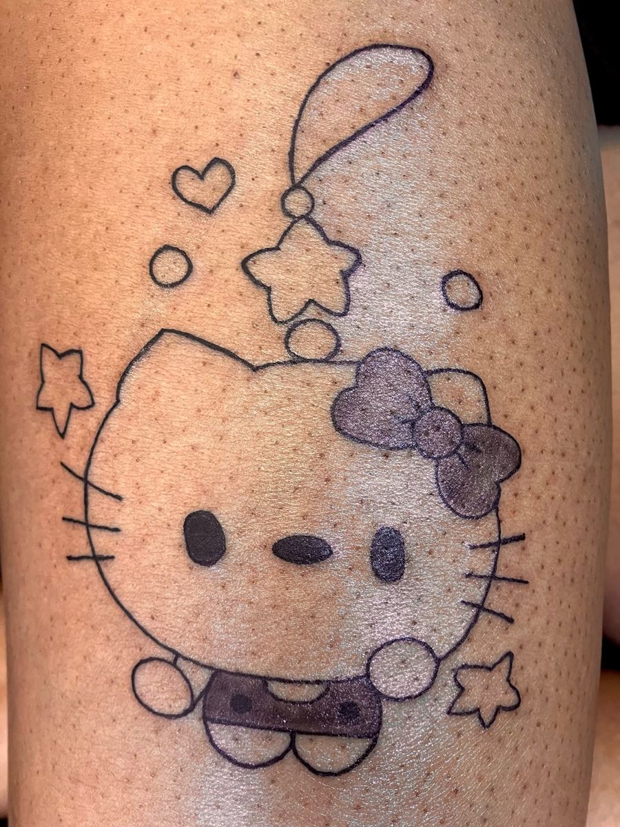 Hello Kitty neo-traditional line work tattoo — Cade Bennett, Anchorage tattoo artist AK Tattoo