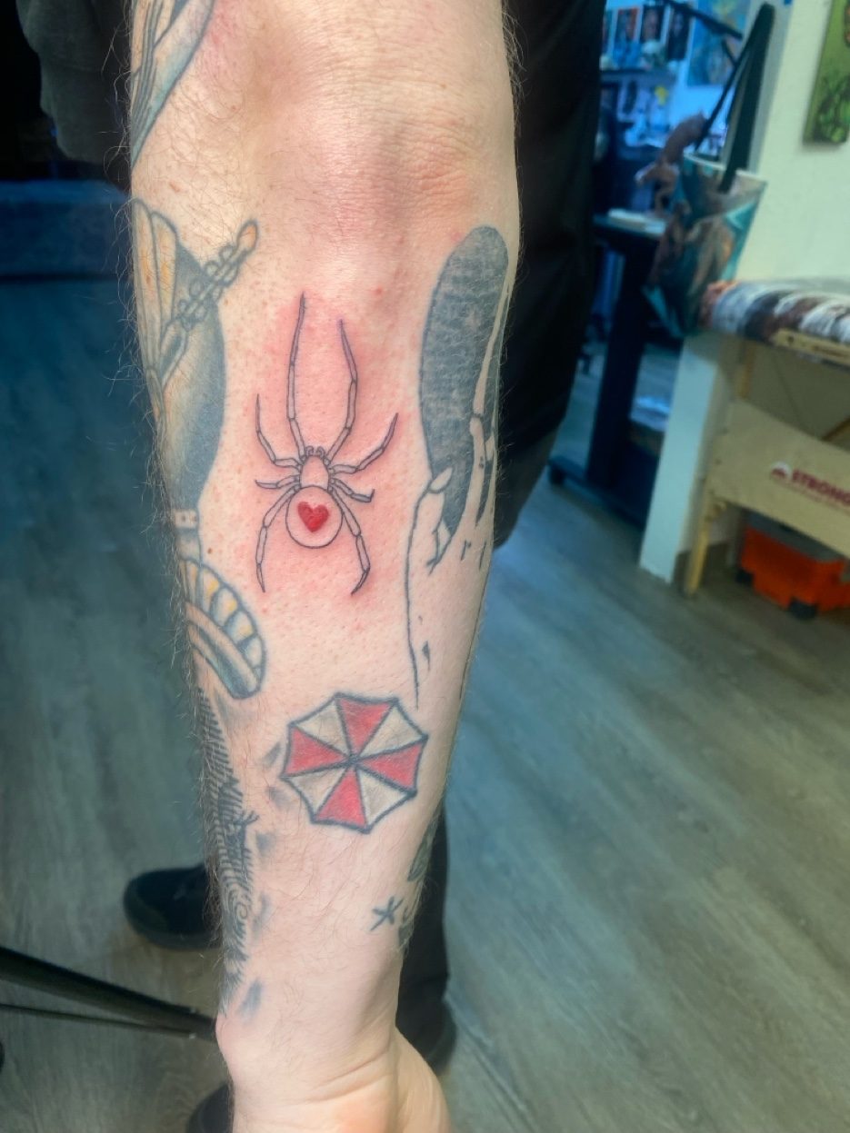 Tribal lower back tattoo — Cade Bennett, tattoo artist AK Tattoo 409 W Northern Lights Anchorage